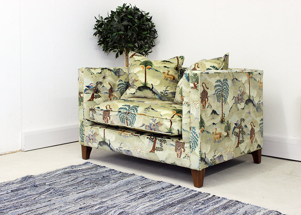 Linwood sofa in animal and tropical tree print